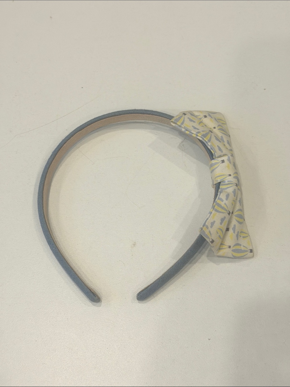 Blue Fabric Headband with Patterned Yellow Bow Accent